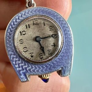 Vintage enamel silver  winding Watch, with 24” silver chain.